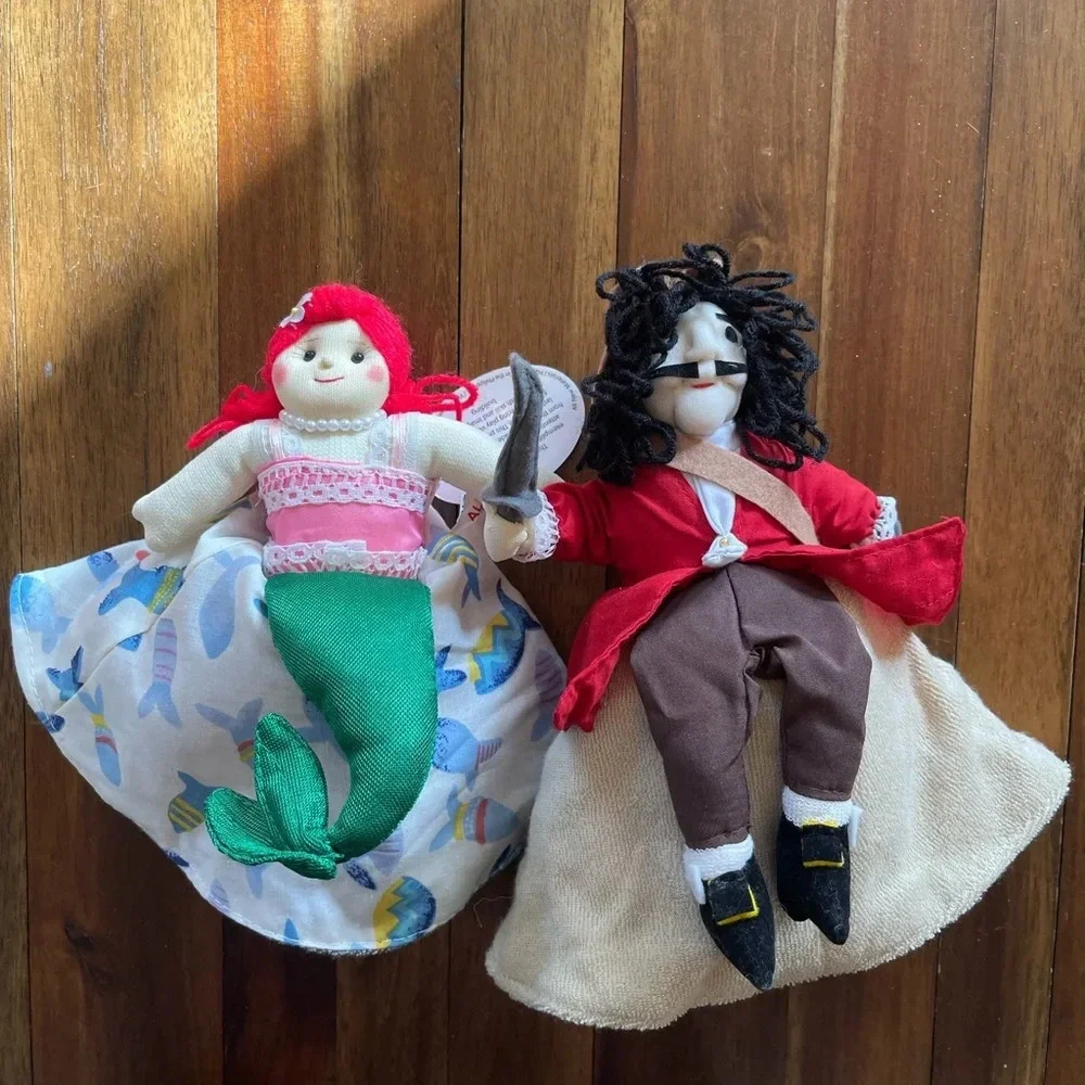 Alma’s Designs little mermaid and Peter Pan flip dolls